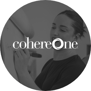 CohereOne logo inside dark circle